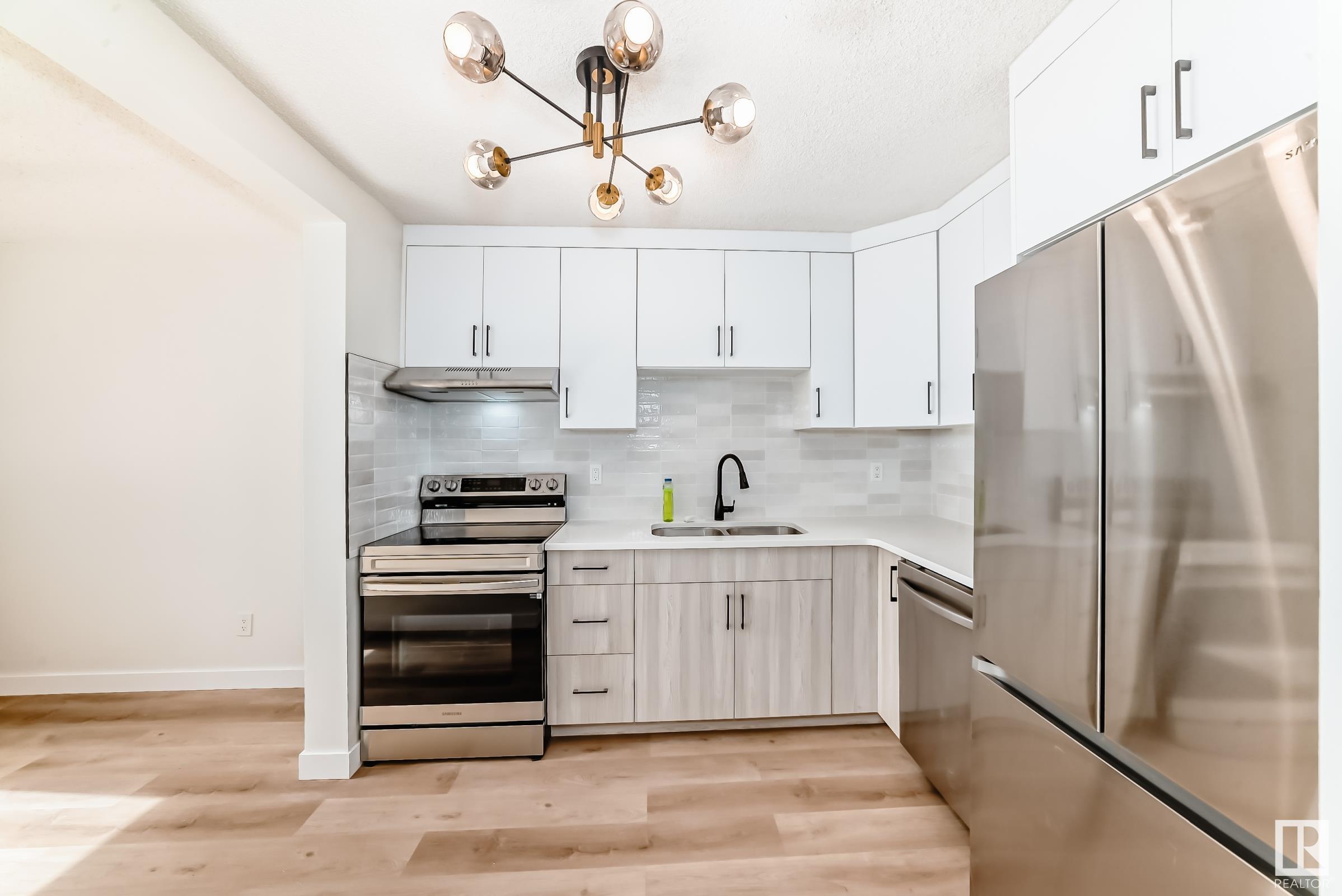 Property Photo: 14233 23 Street NW AB T5Y 1E8