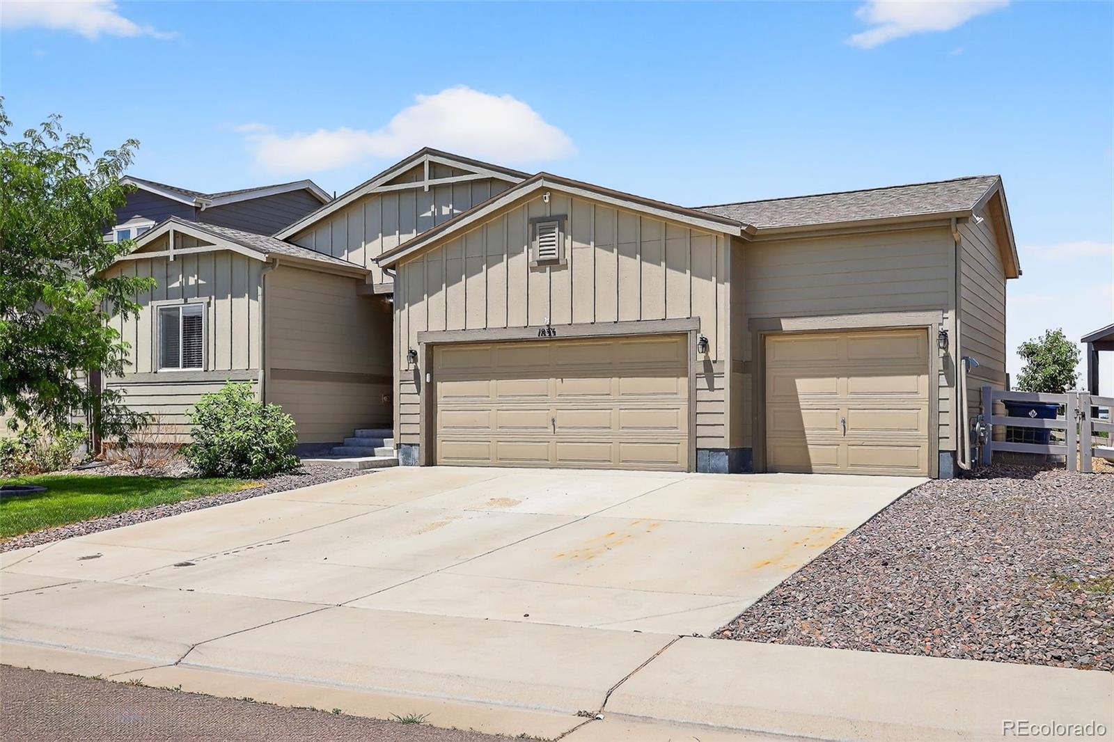 Property Photo: 1833 Homestead Drive CO 80621