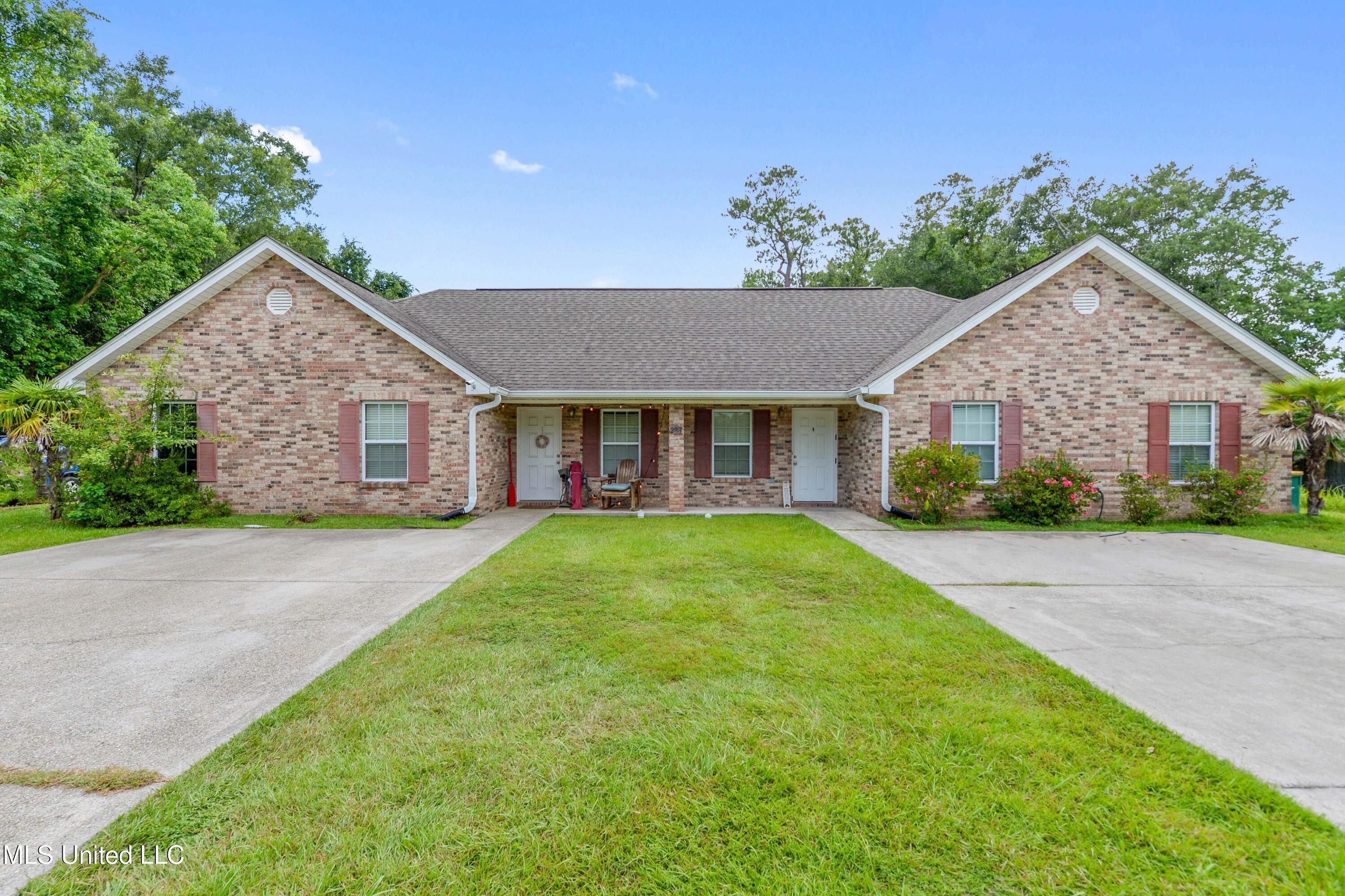 Property Photo:  207 Reed Avenue  MS 39560 