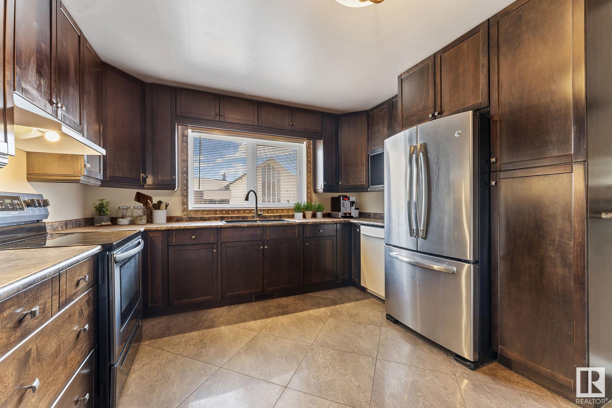 Property Photo:  13220 95 Street NW  AB T5E 3Y4 