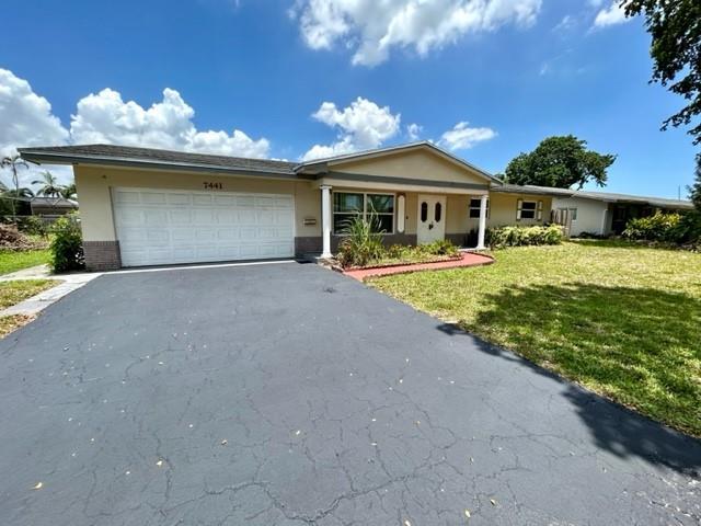 Property Photo: 7441 NW 13th St FL 33313