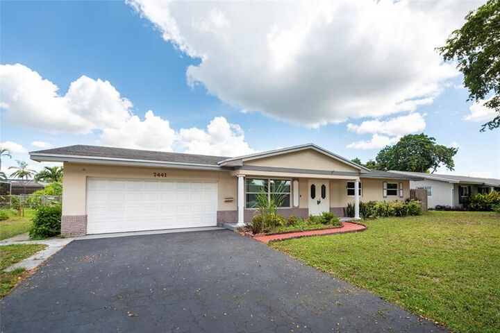 Property Photo:  7441 NW 13th St  FL 33313 