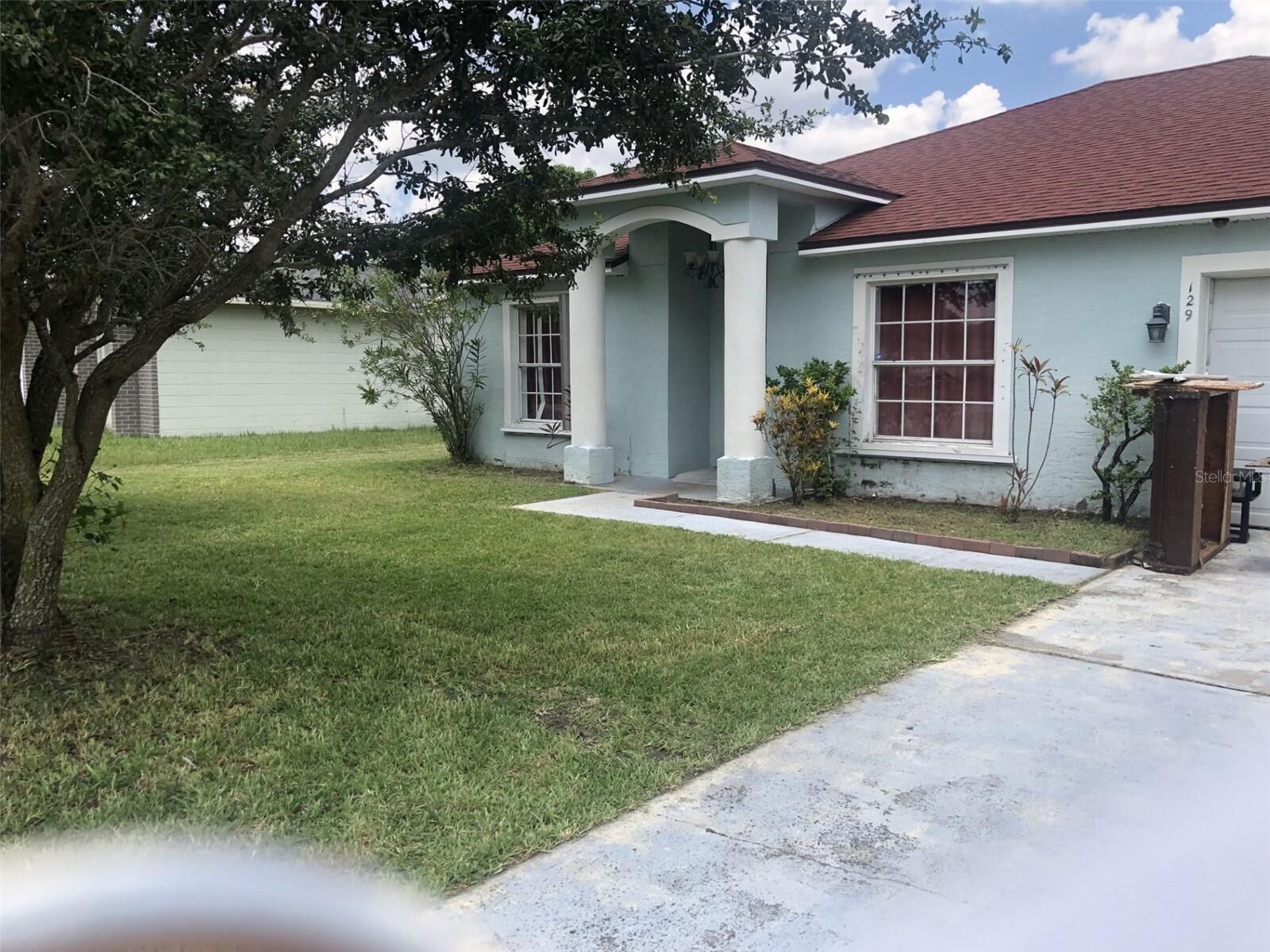 Property Photo:  129 Acapulco Drive  FL 34743 