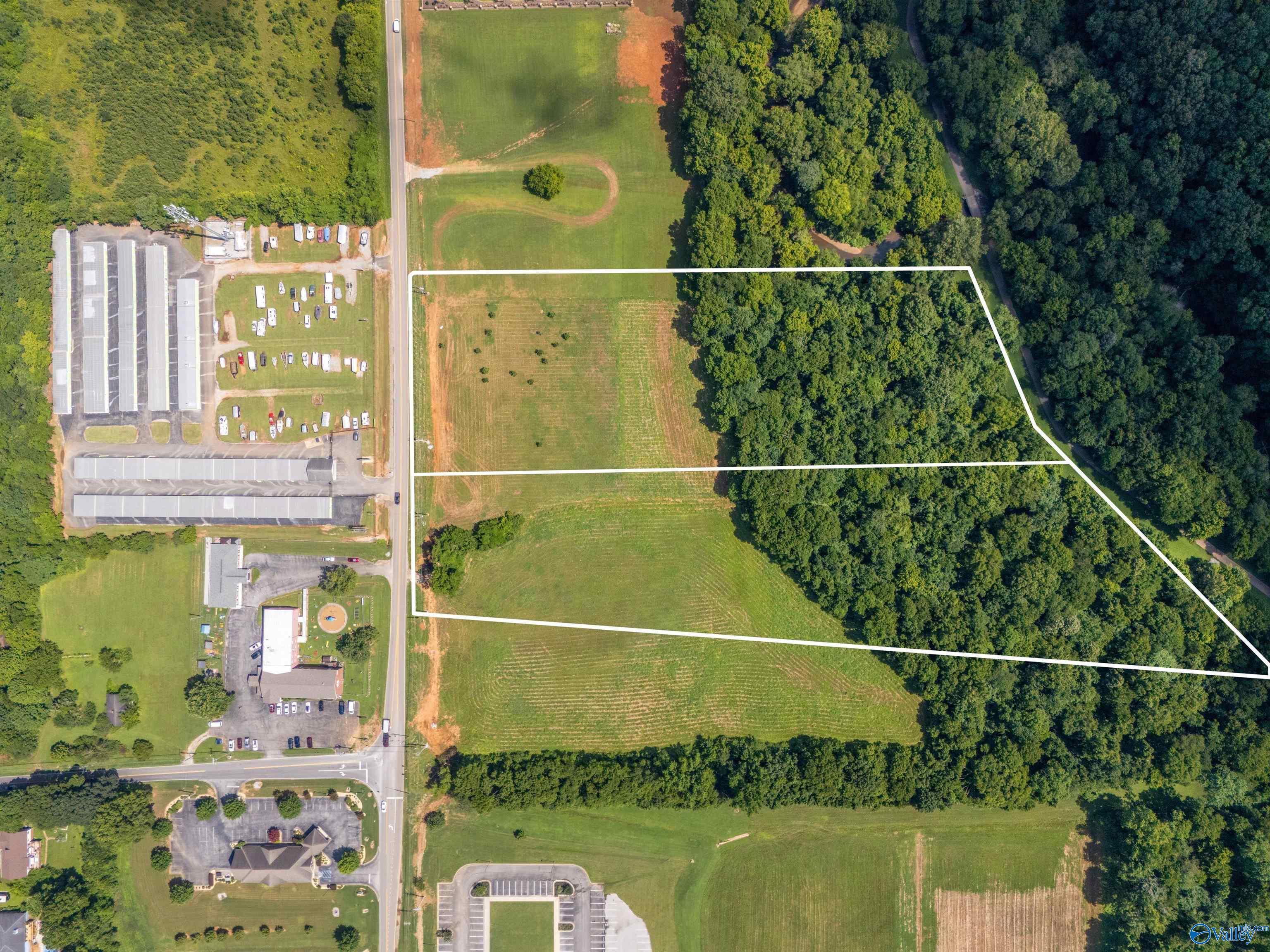 Property Photo:  5.6 Acres S Slaughter Road  AL 35758 