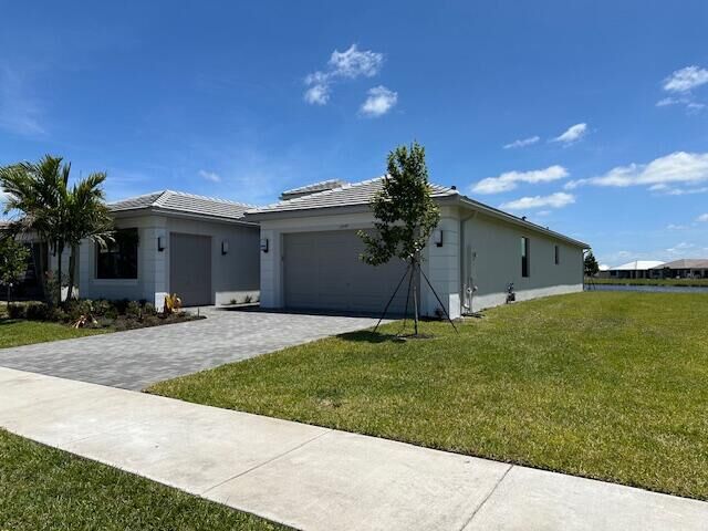 Property Photo: 12449 SW La Costa Street FL 34987