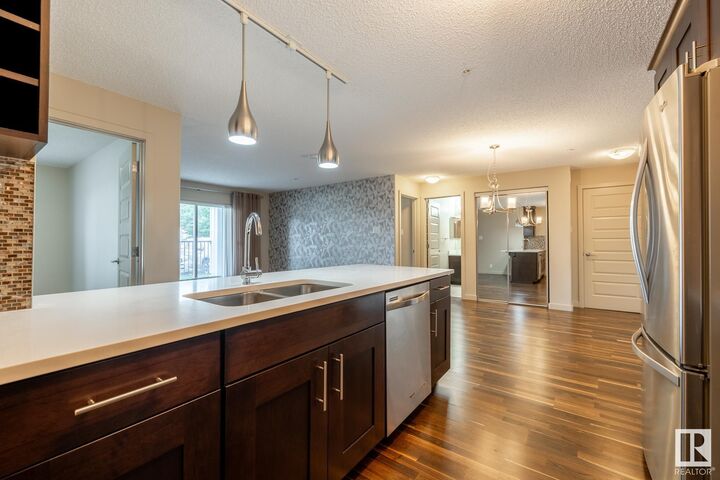Property Photo:  4008 Savaryn Drive SW 116  AB T6X 2E5 