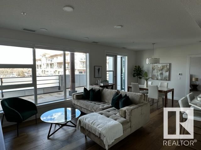 Property Photo:  61 Festival Way 410  AB T8A 4Y9 