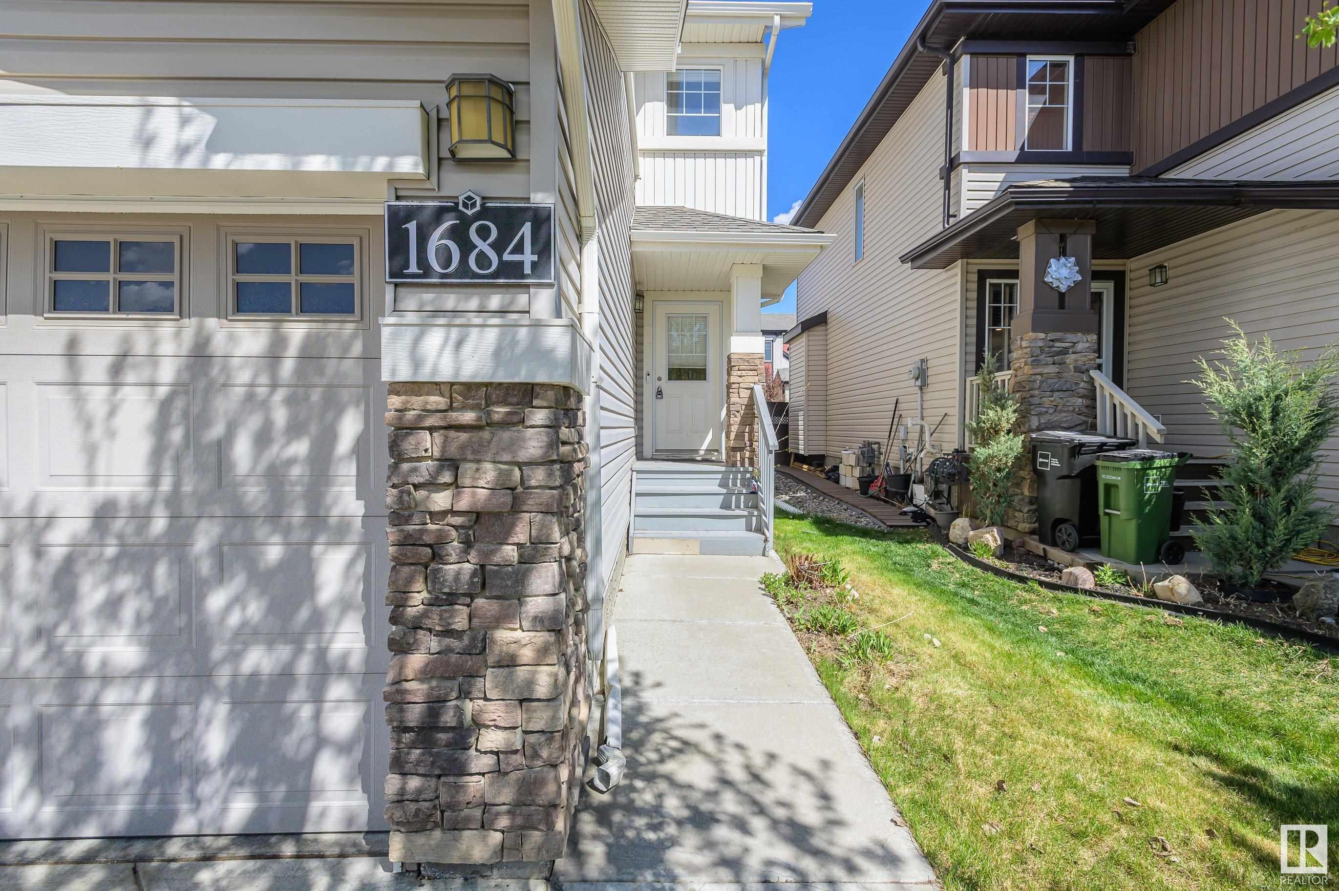 Property Photo: 1684 Cunningham Way SW AB T6W 0W5