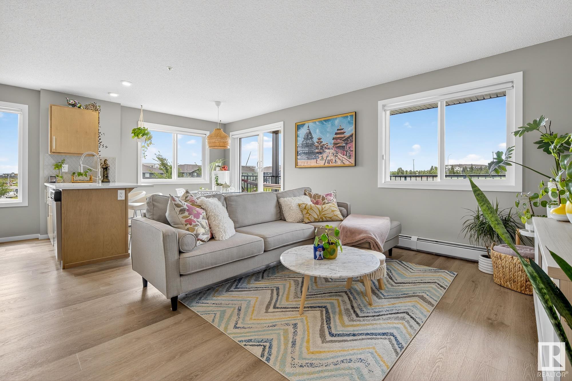 Property Photo: 148 Ebbers Boulevard NW 237 AB T5Y 4A4