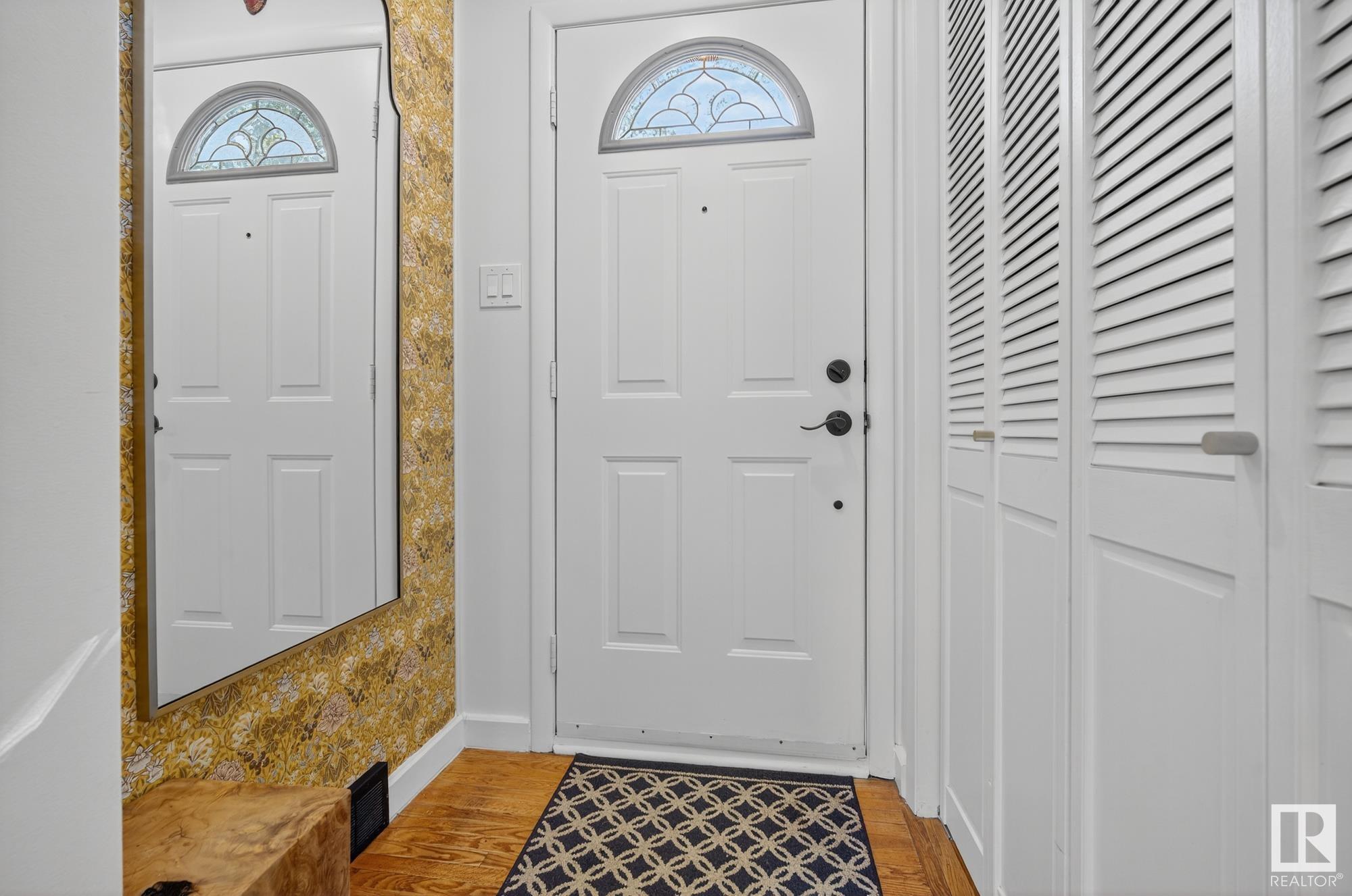 Property Photo:  10940 130 Street NW  AB T5M 0Z3 