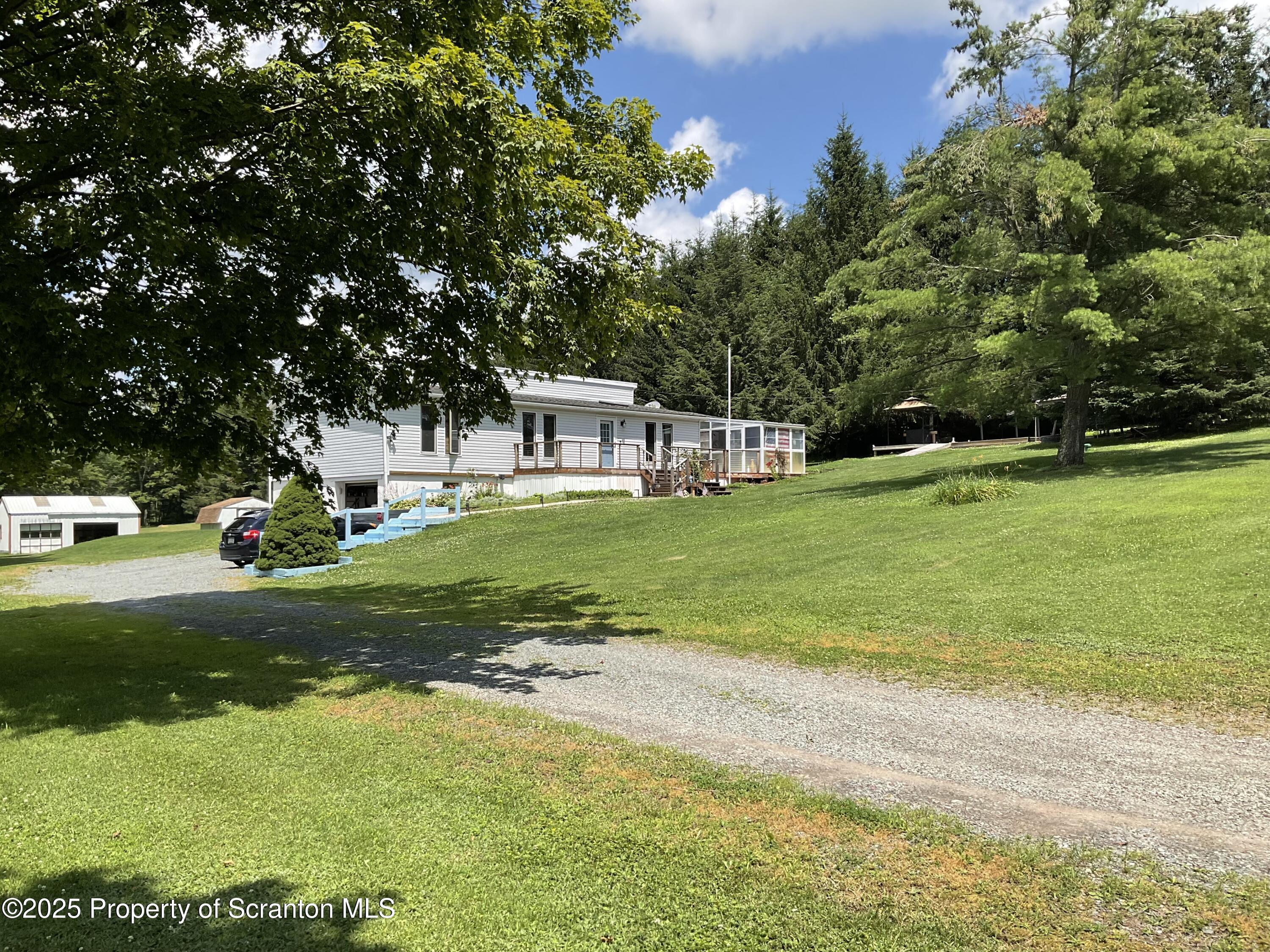 Property Photo:  135 Spudeno Road  PA 18444 