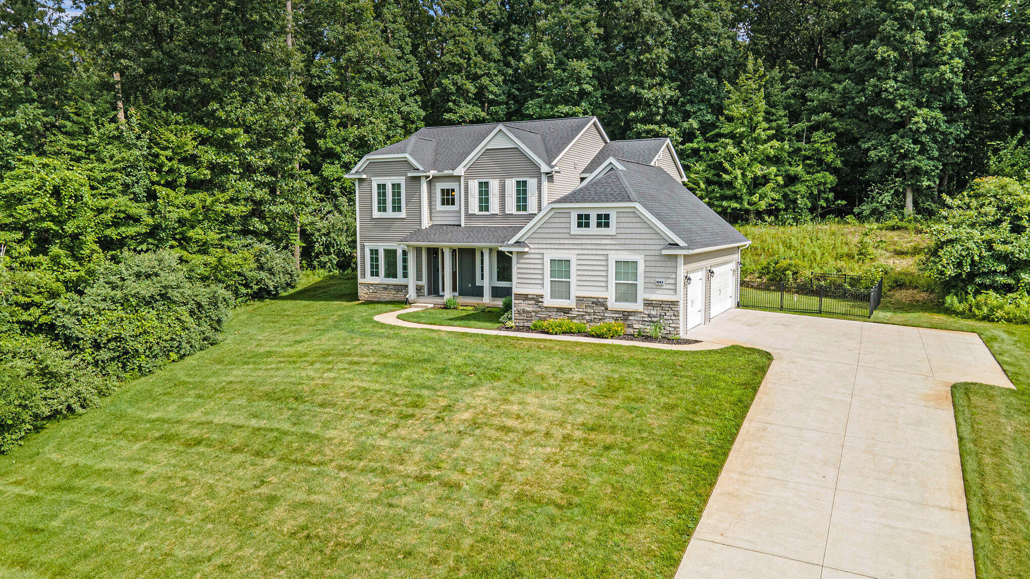 Property Photo: 9243 Trafalgar Drive SE MI 49302