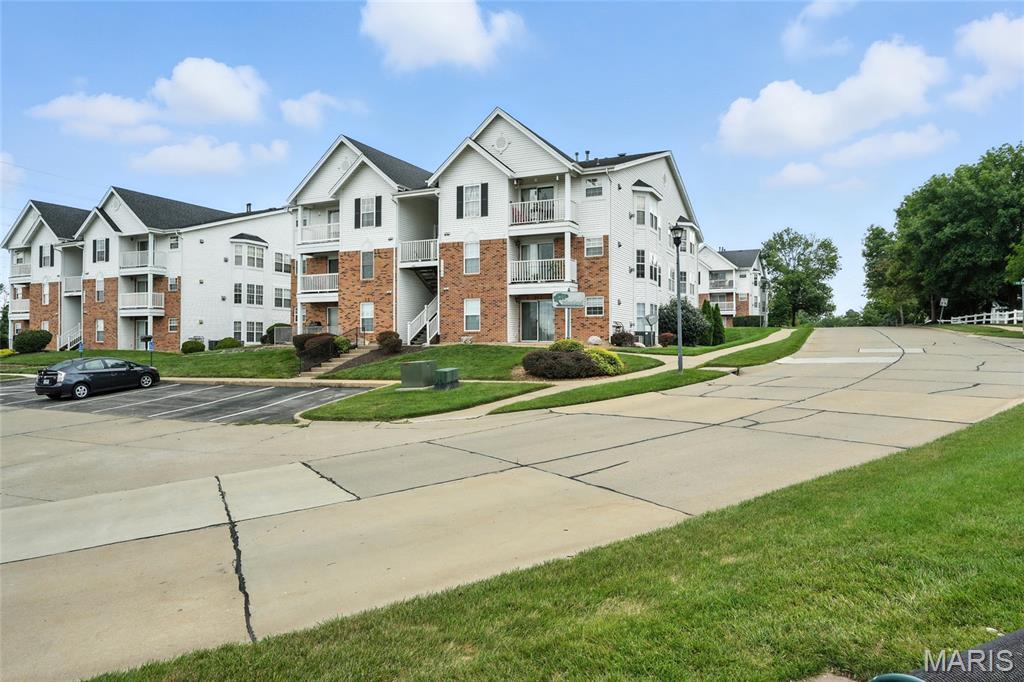 Property Photo: 1209 Woodland Point Drive K MO 63146
