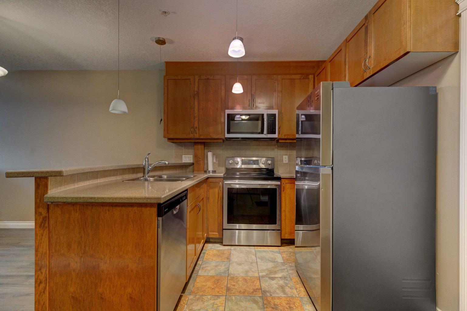 Photo de la propriété: 10 Hemlock Crescent SW 309 AB T3C 2Z1