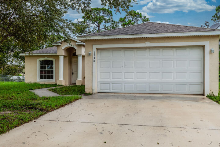 Property Photo: 1990 SE Floresta Drive FL 34983
