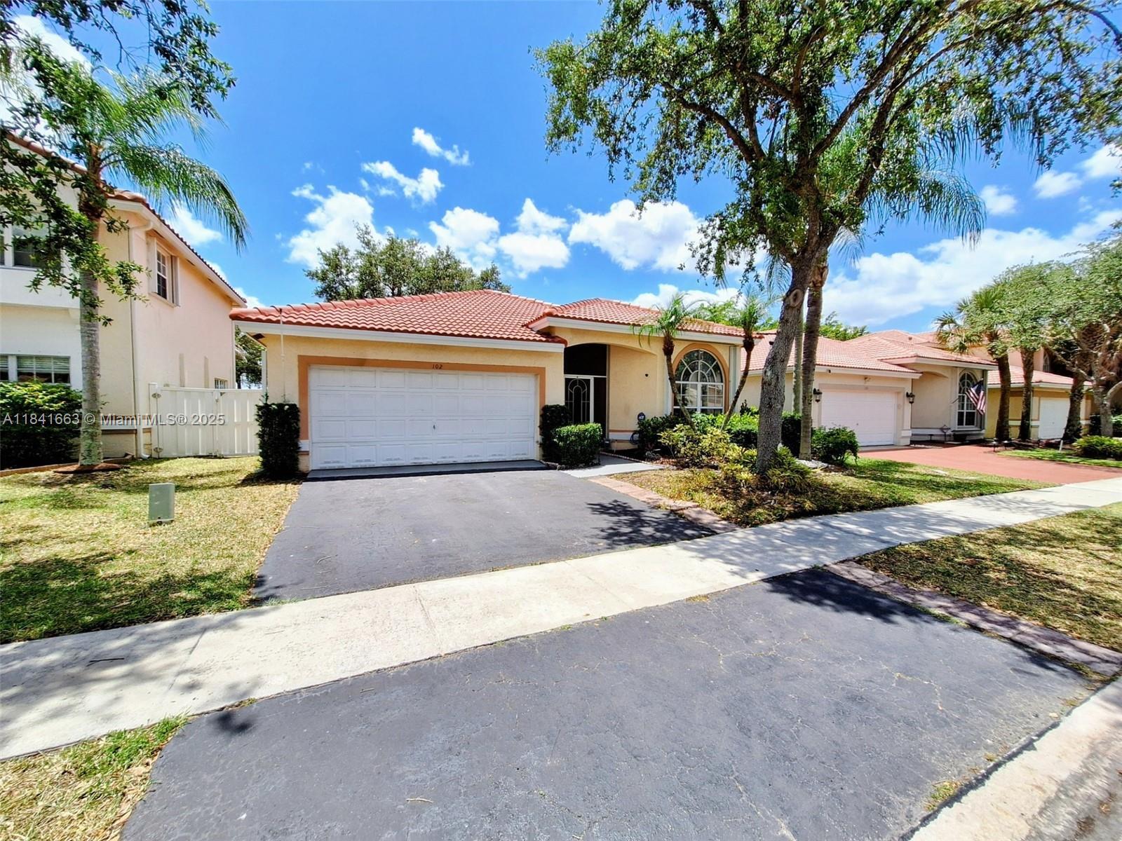 Property Photo: 102 Gables Blvd FL 33326