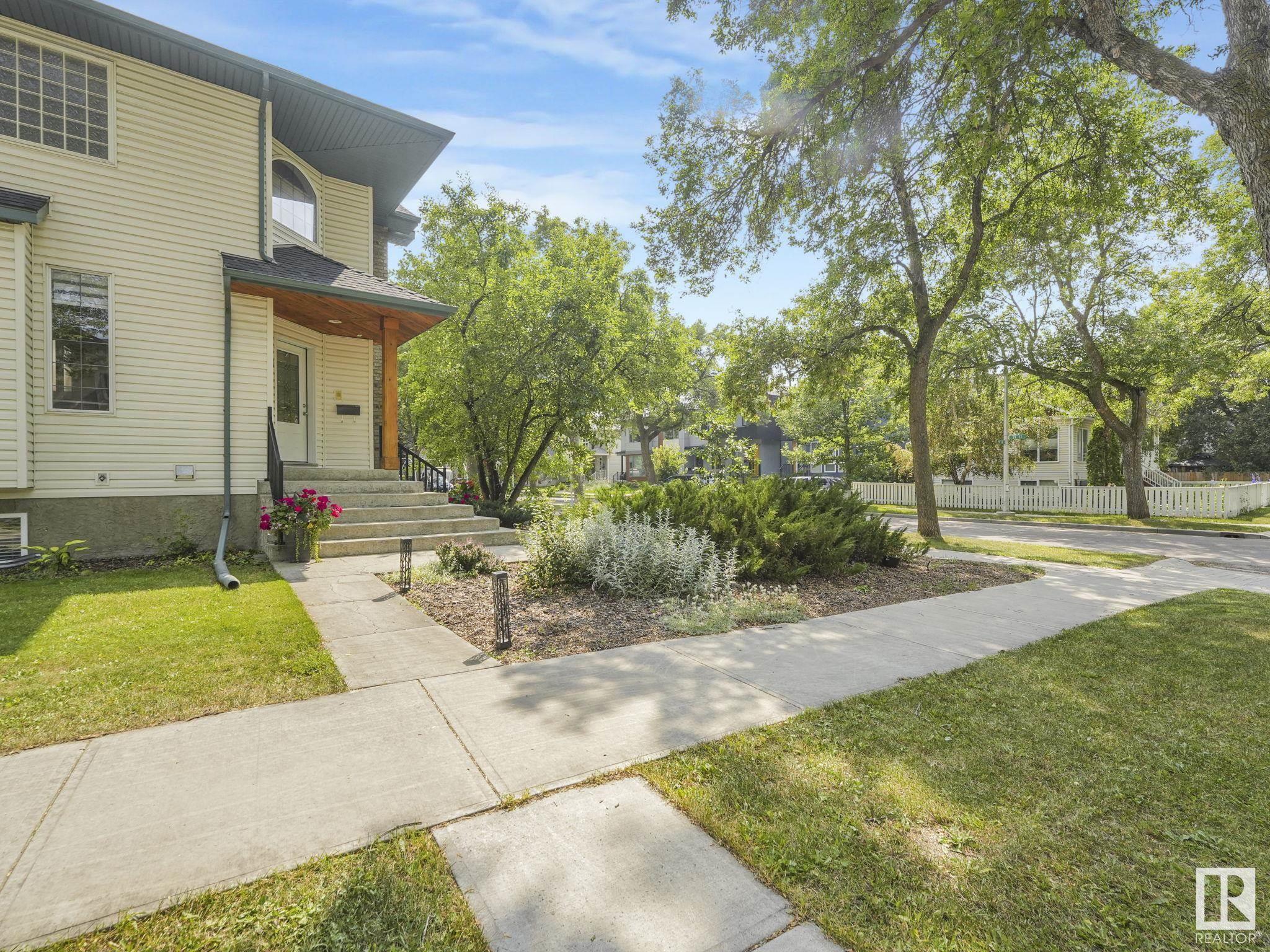 Property Photo:  8849 91 Street NW  AB T6C 3N3 