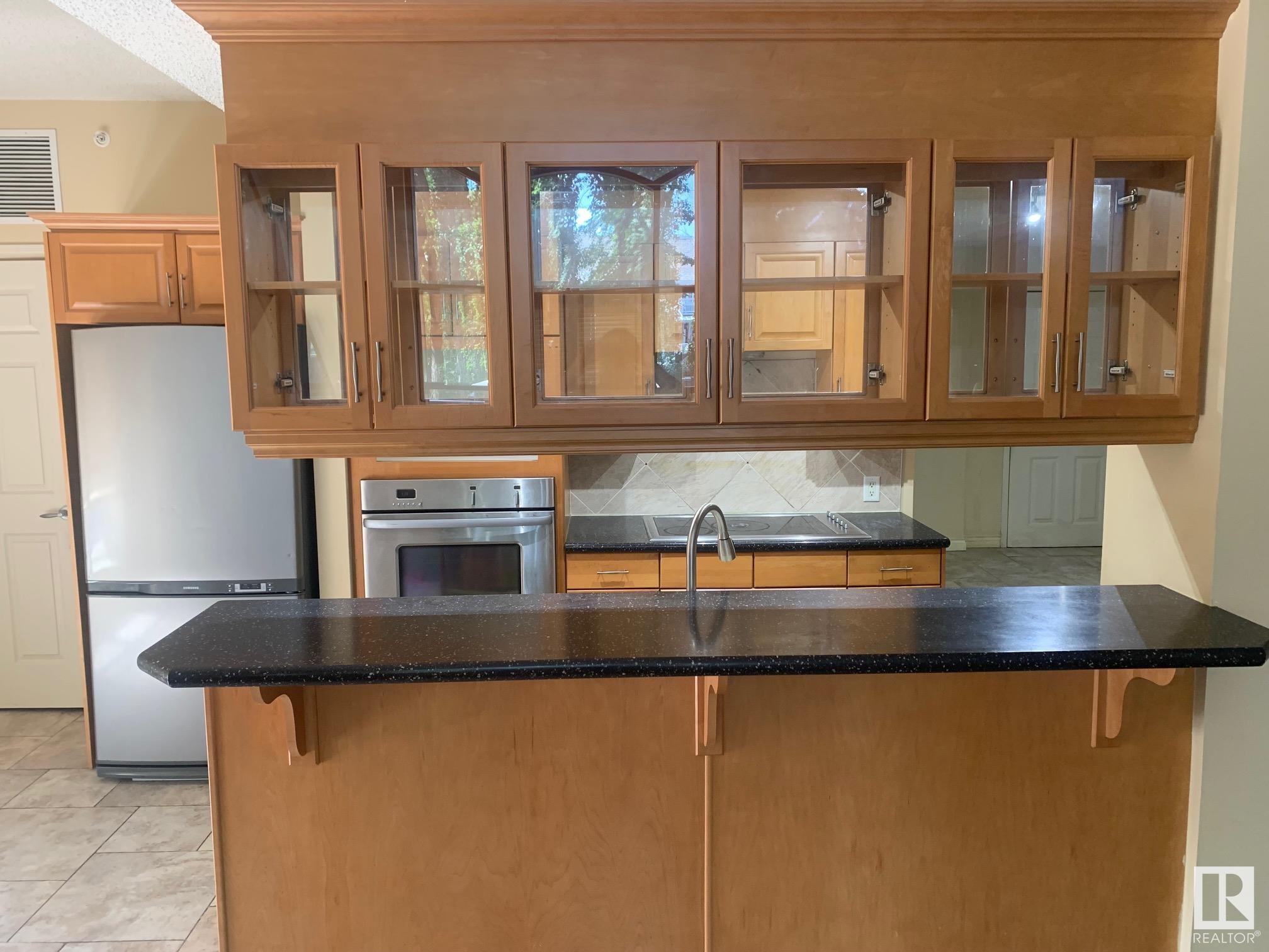 Property Photo:  10108 125 Street NW 105  AB T5N 4B6 