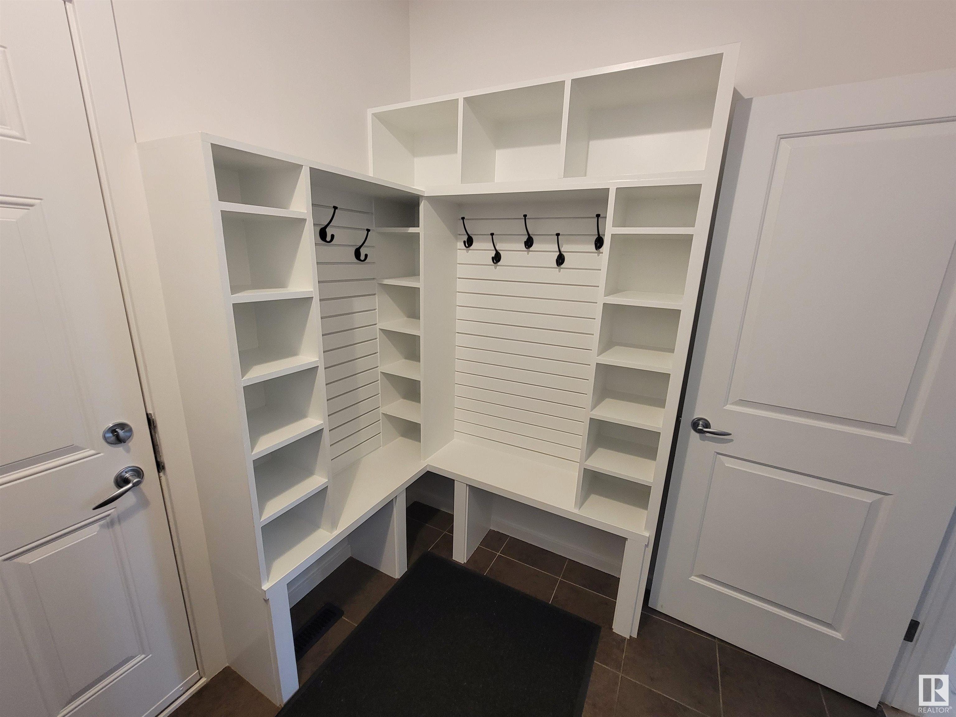 Property Photo:  1669 Hector Road NW  AB T6R 3B8 