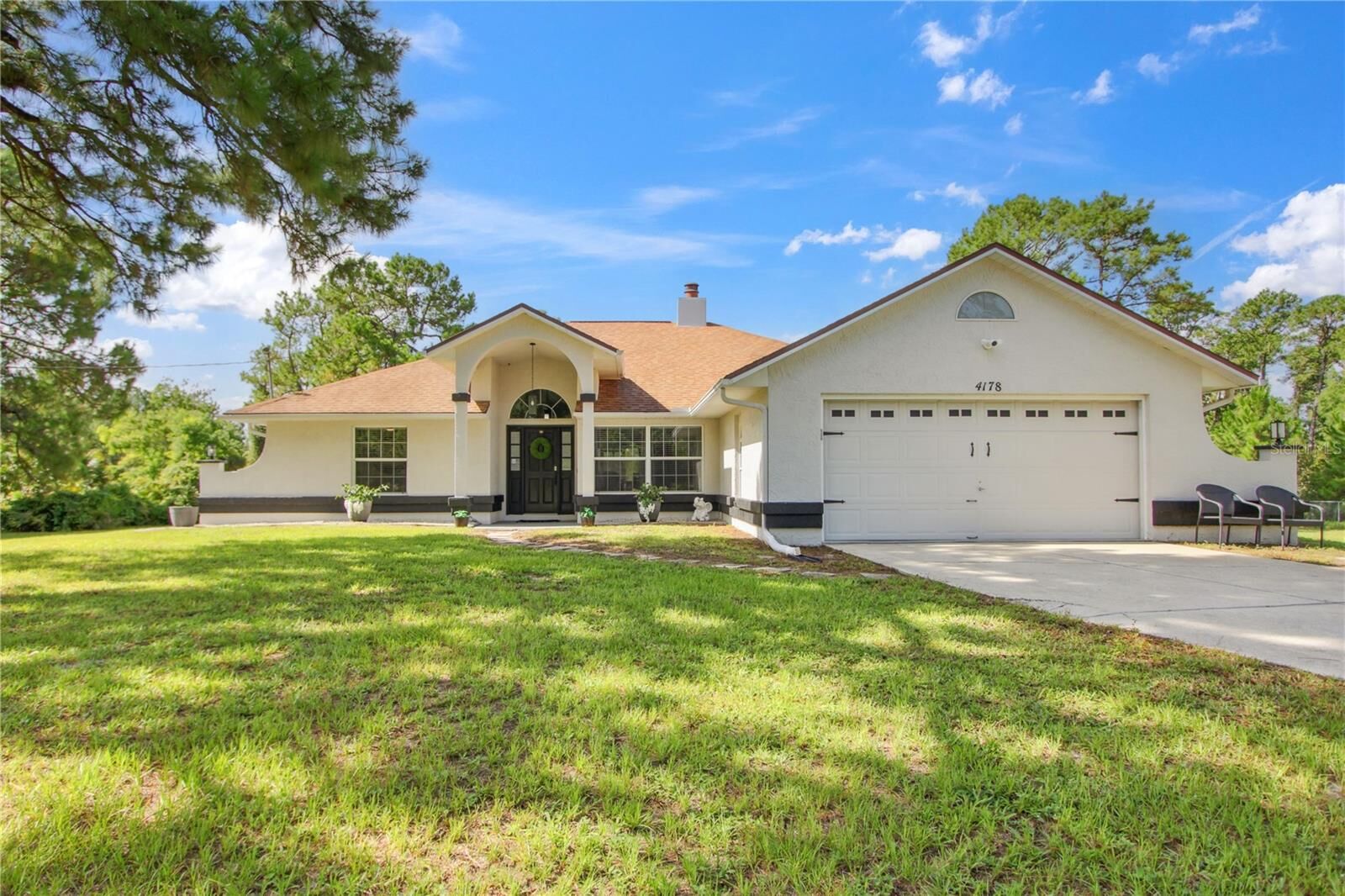 Property Photo: 4178 Falling Leaf Drive FL 32168