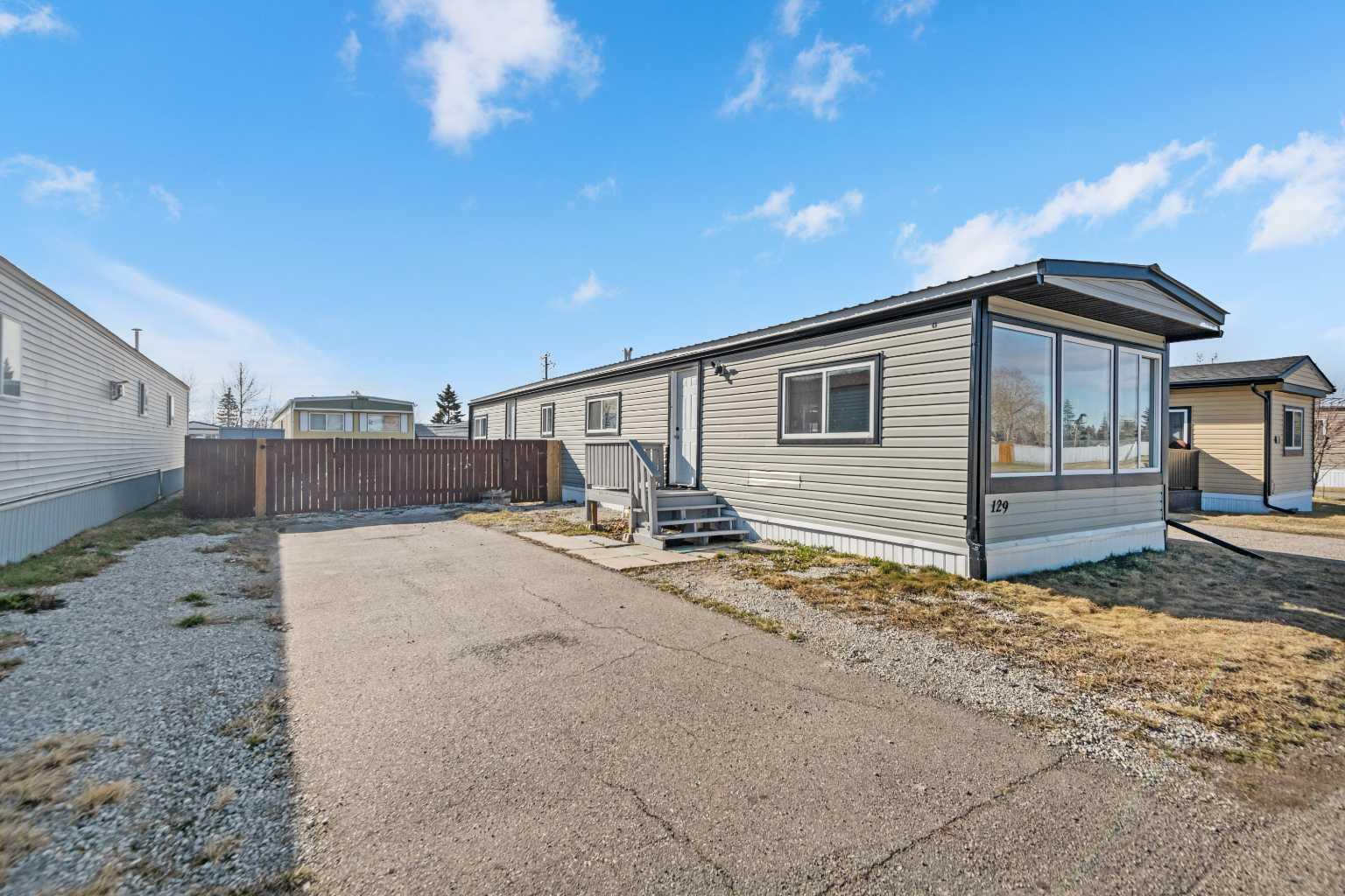 Property Photo: 6220 17 Avenue SE 129 AB T2A 0W6
