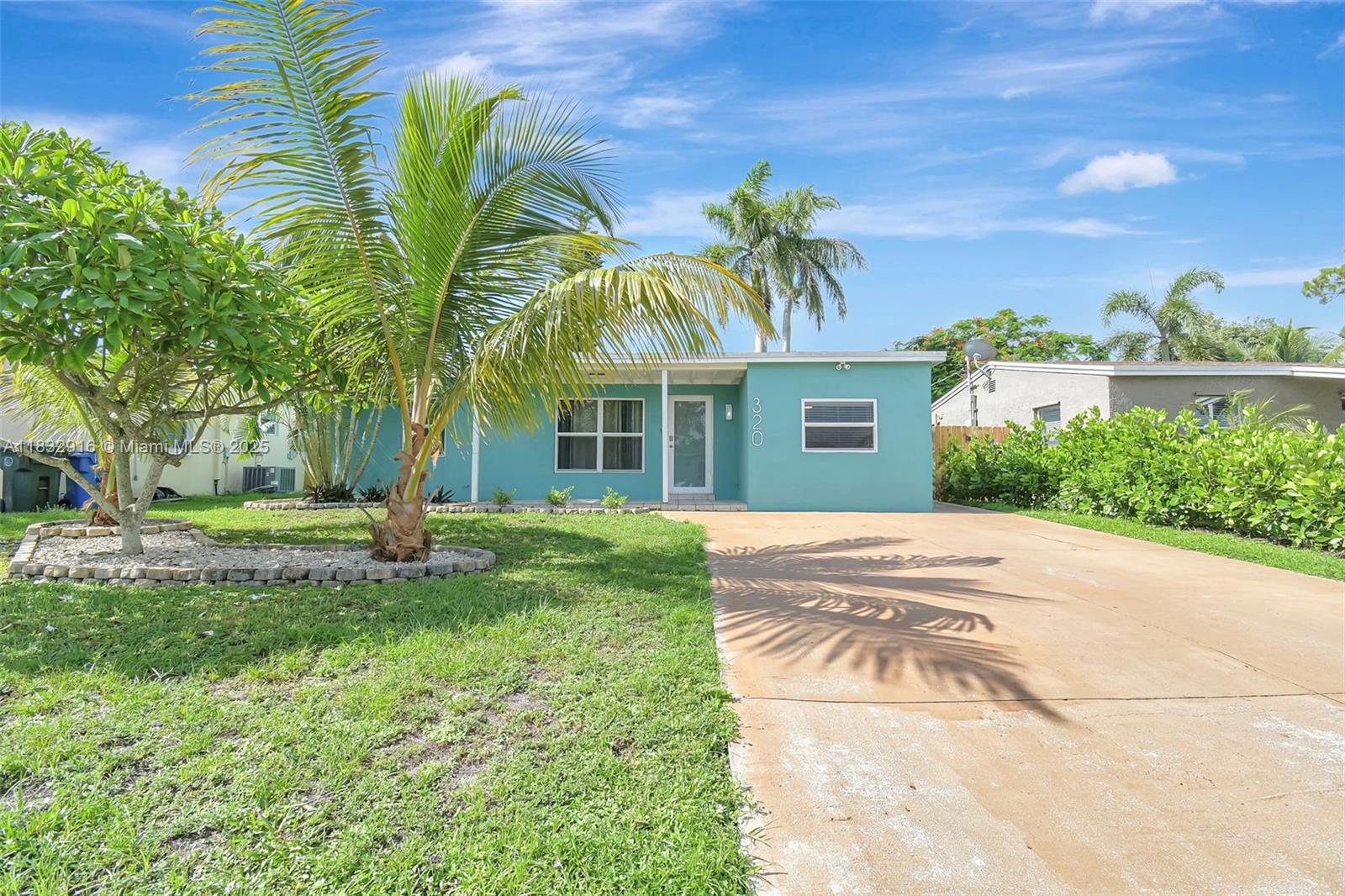 Property Photo:  320 NW 51st Ct  FL 33309 