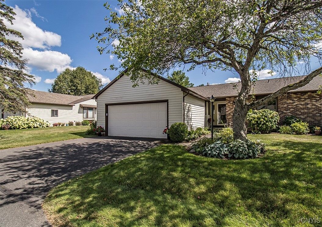 Property Photo:  713 Kimry Moor  NY 13066 