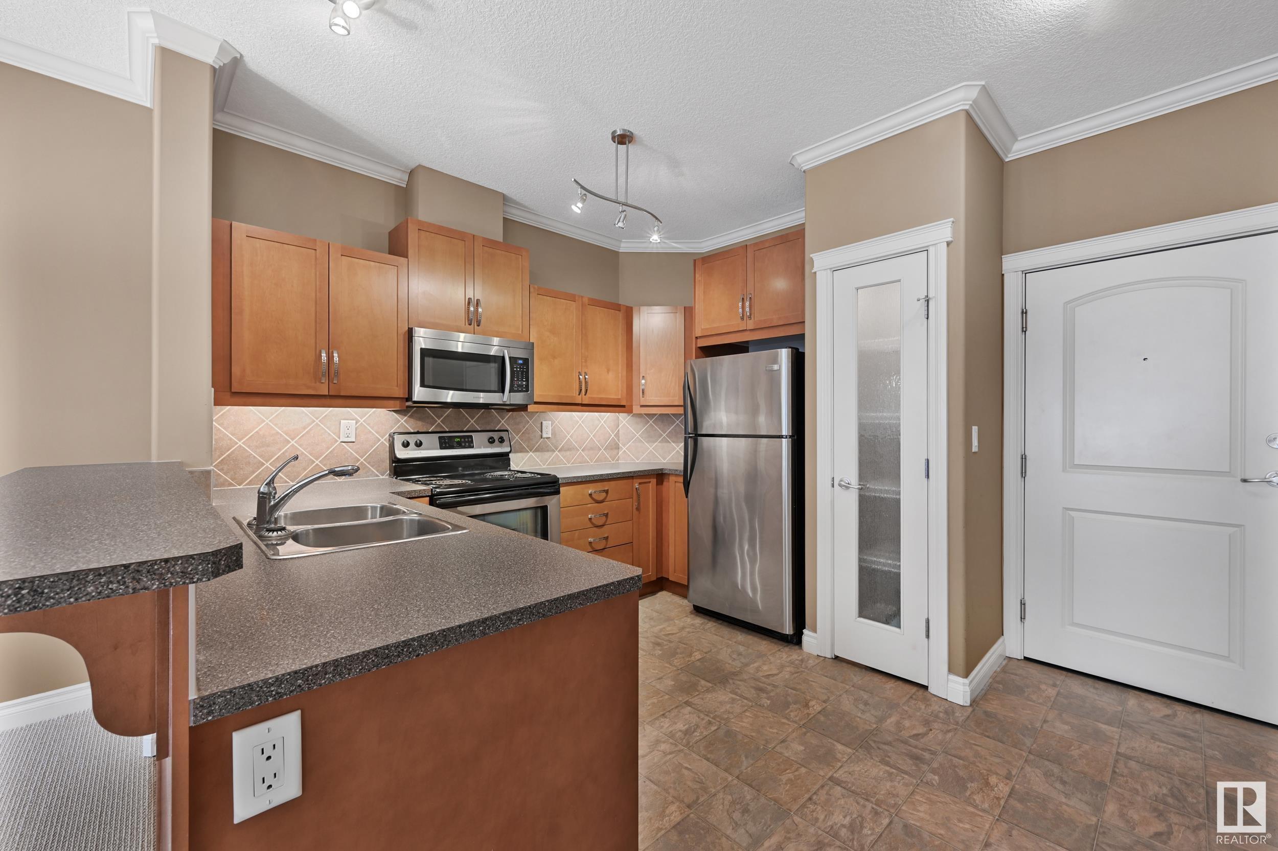Photo de la propriété: 10121 80 Avenue NW 319 AB T6E 0B9