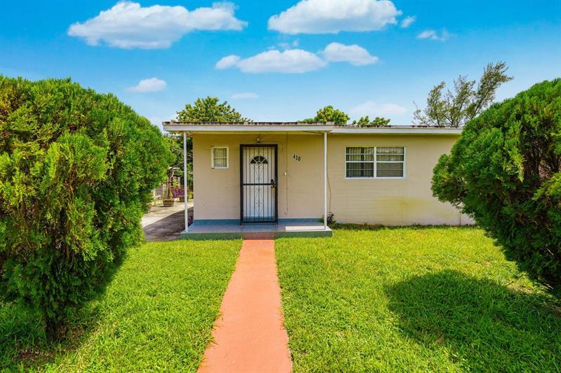 Property Photo:  430 NW 133rd St  FL 33168 