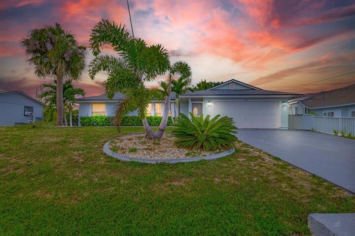 Property Photo: 509 SW Hamburg Ter FL 34984