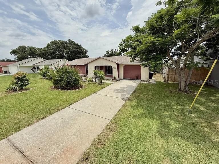 Property Photo:  716 Caribou Drive  FL 34759 