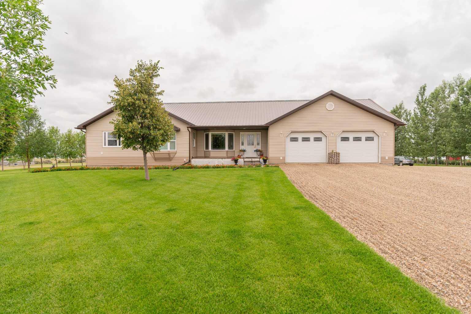 Property Photo:  123047 Township Road 102  AB T0K 0J0 