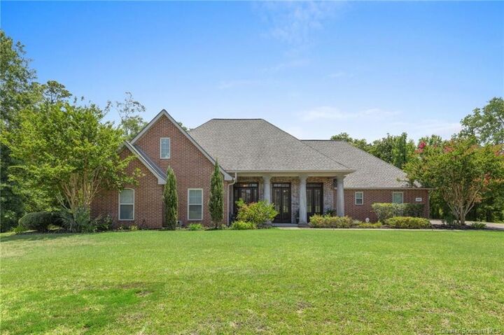 Property Photo: 1663 S Woodland Forest Drive S LA 70611
