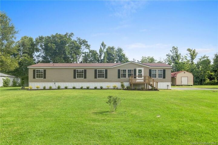 Property Photo:  1774 W. Liechty Road  LA 70611 