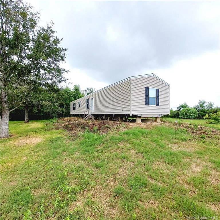 Property Photo: 203 Ida Lane LA 70607