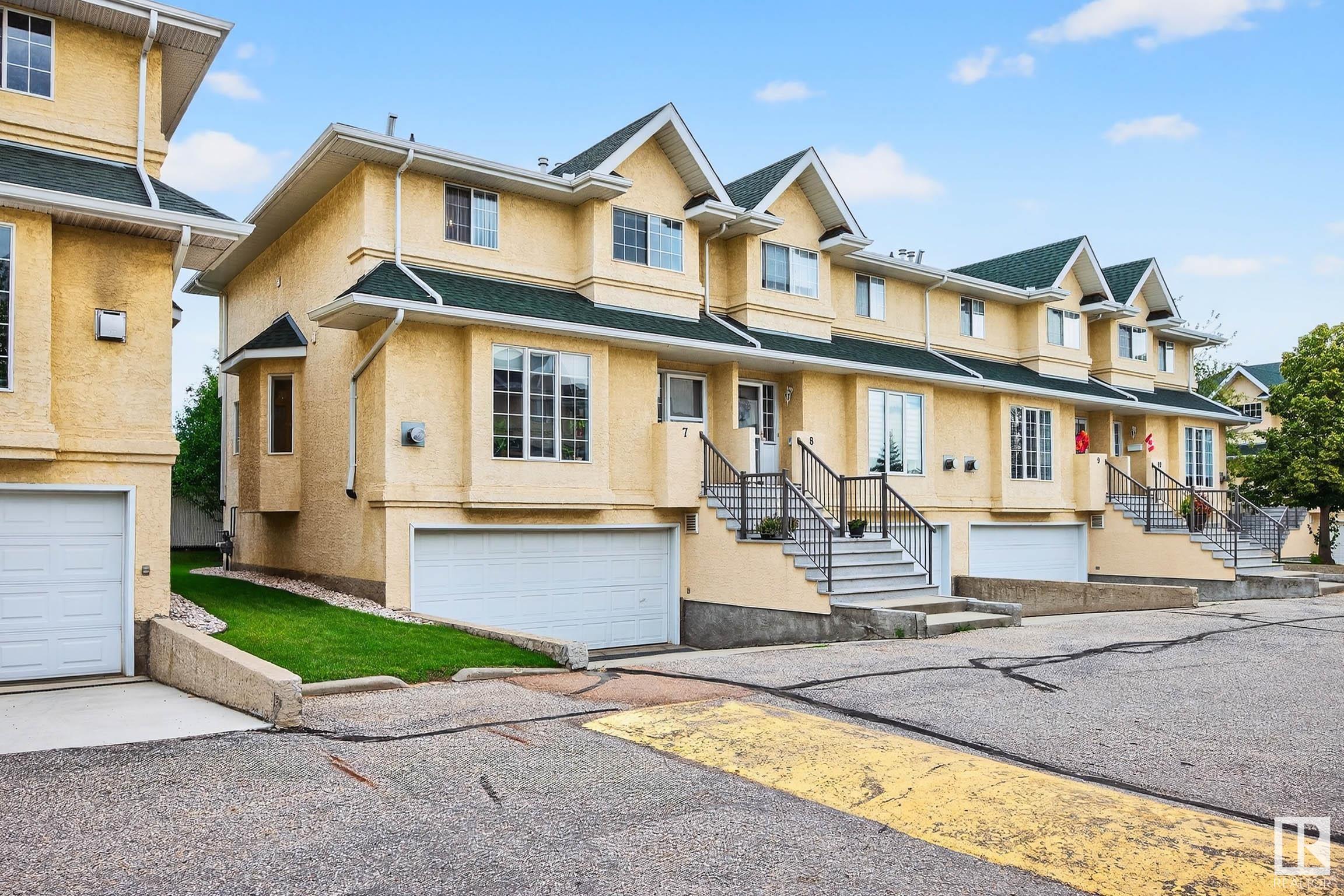 Property Photo: 2419 133 Avenue NW 7 AB T5A 5A5