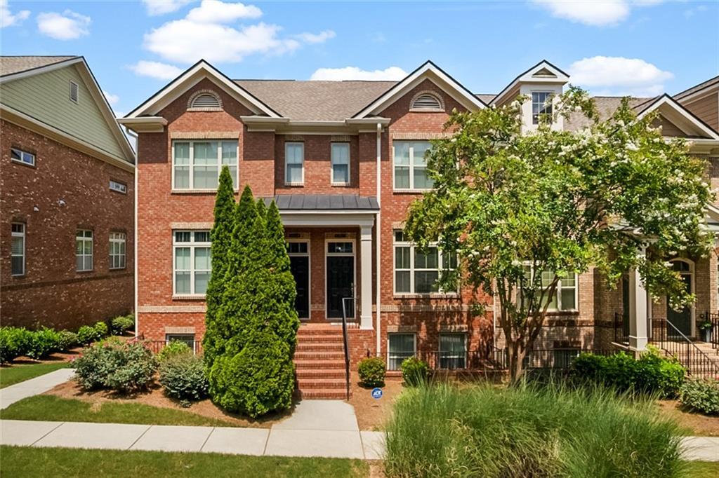 Property Photo: 10860 Ellicot Way GA 30022