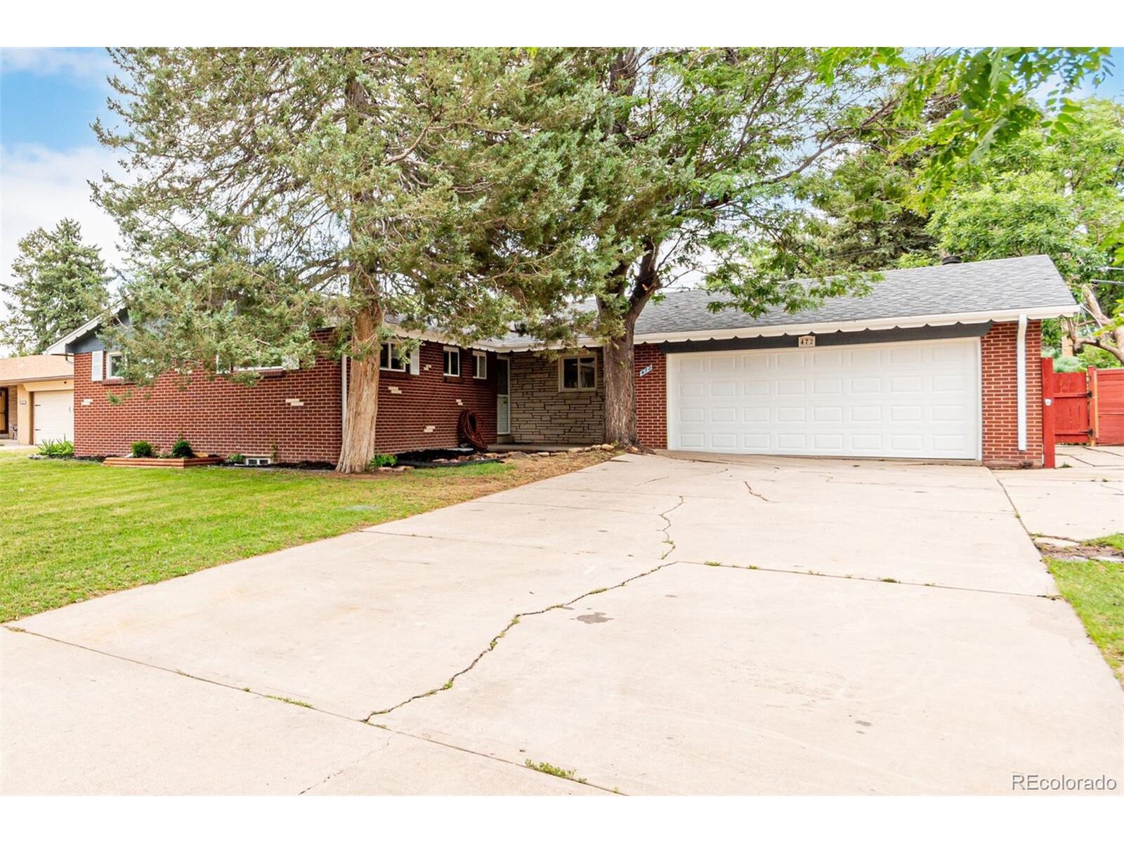 Property Photo:  472 Jamaica St  CO 80010 