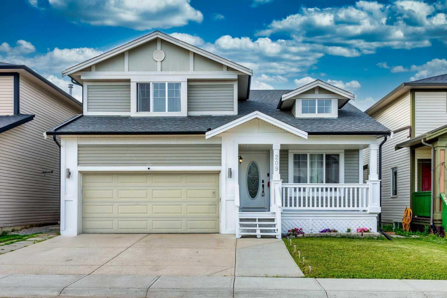 Property Photo: 209 Luxstone Road SW AB T4B 0K5