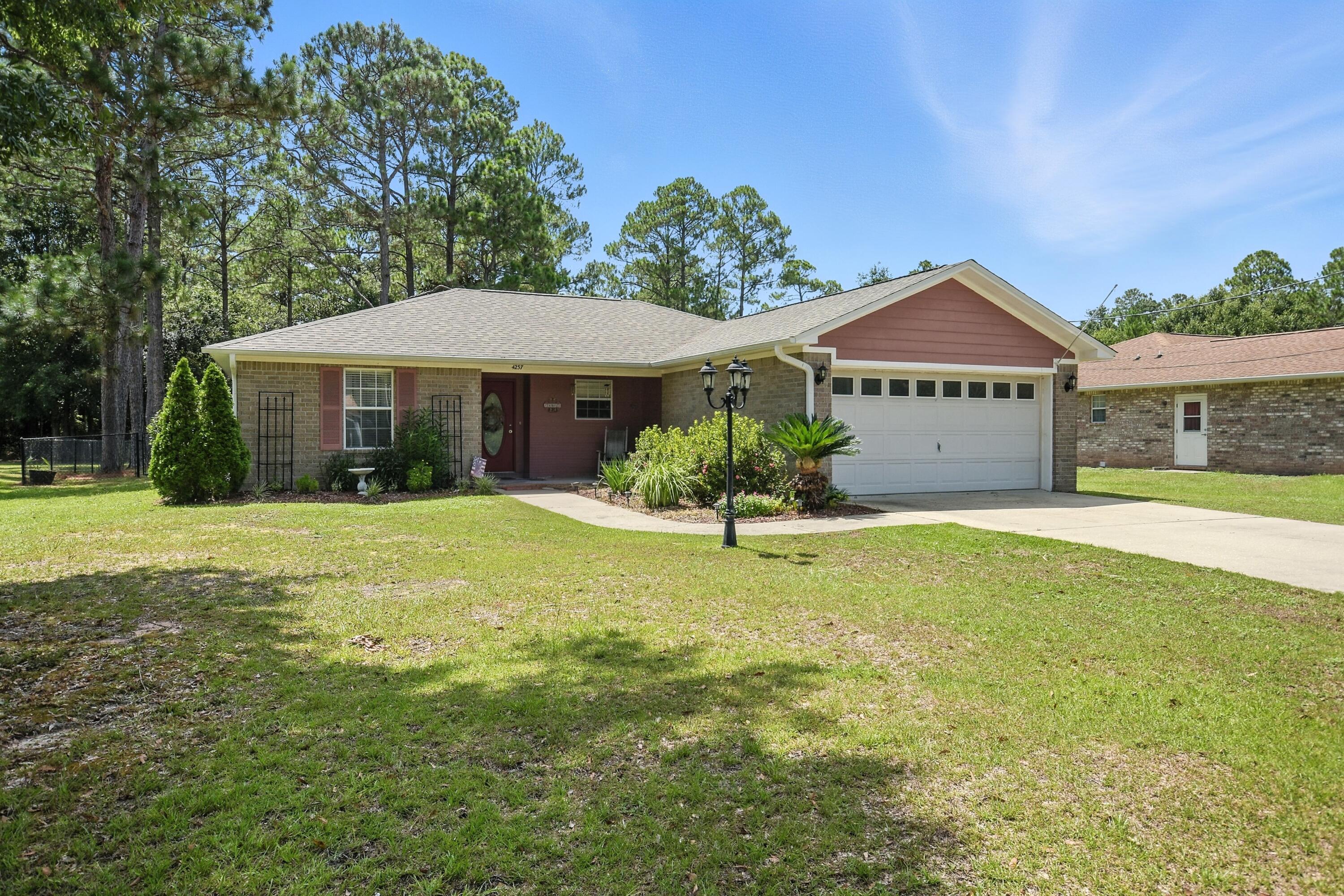 Property Photo: 4237 Melton Road FL 32583