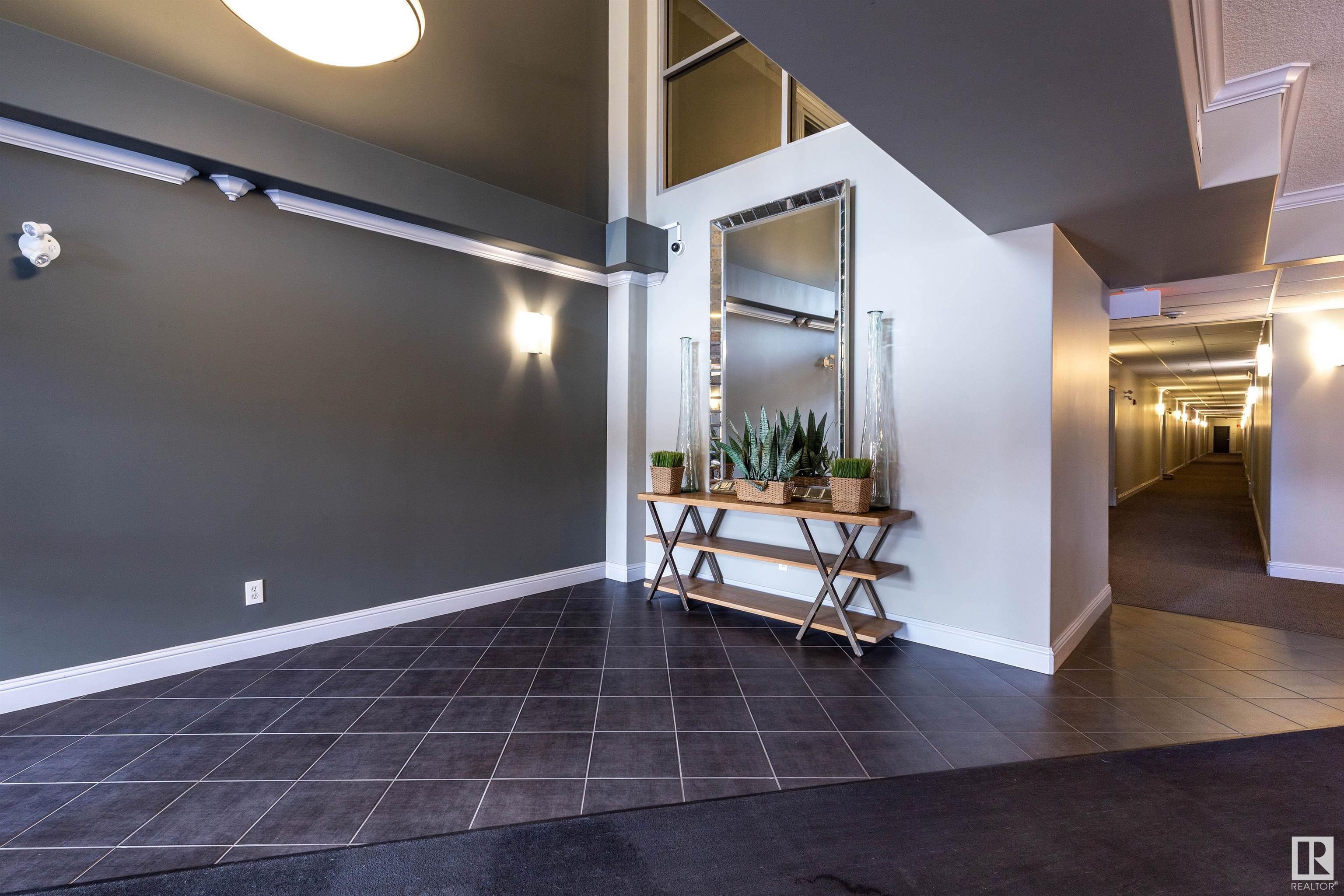 Property Photo: 14604 125 Street NW 112 AB T5X 0B4