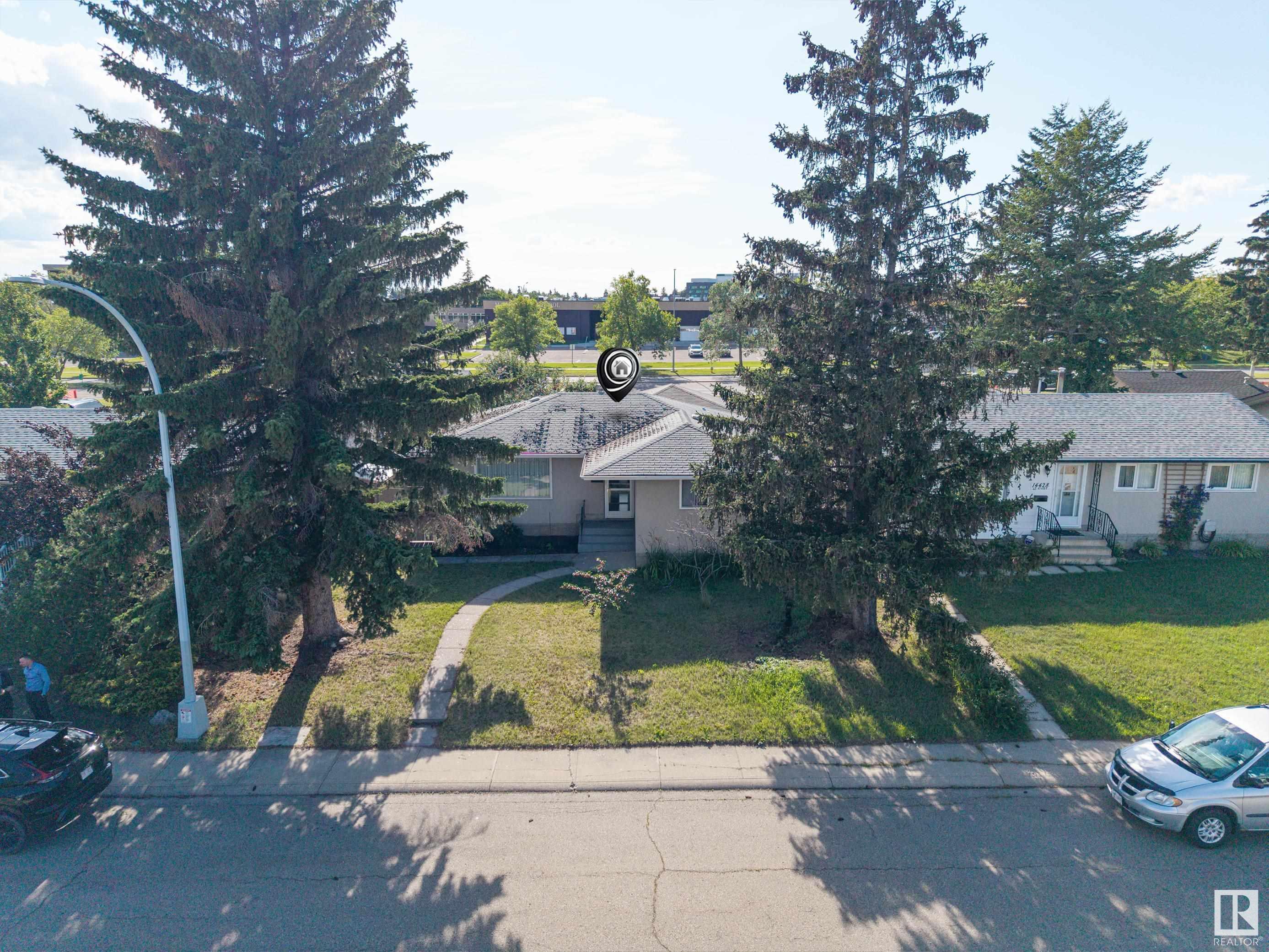 Property Photo: 14424 65 Street NW AB T5A 2E7