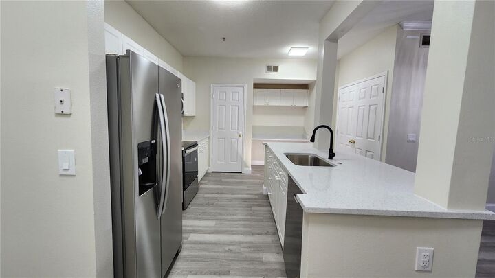 Property Photo: 235 Goldenrain Drive 102 FL 34747