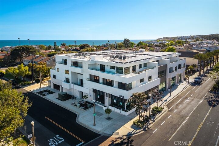 Property Photo: 24722 Del Prado 403 CA 92629