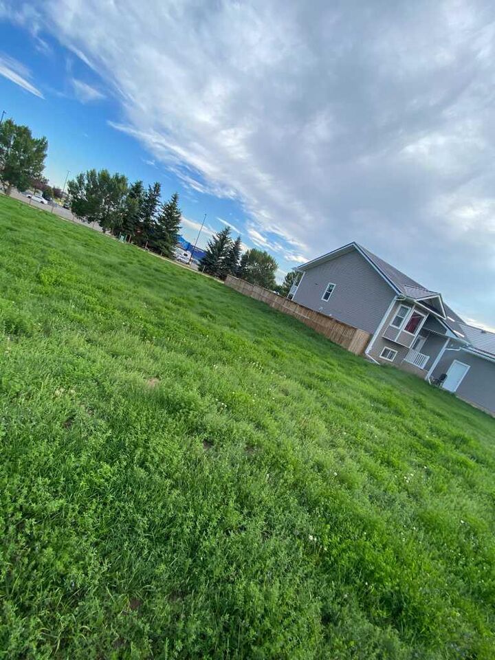 Property Photo: 89 Upland Boulevard W AB T1R 0R1