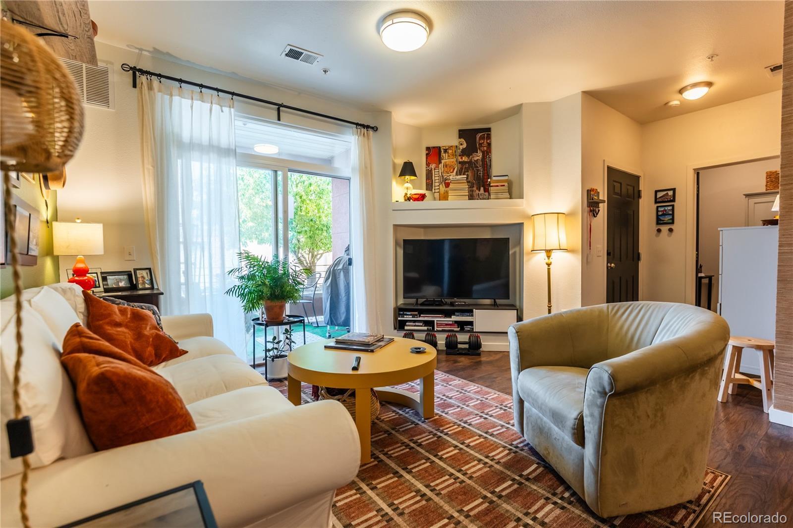 Property Photo: 4100 Albion Street 211 CO 80216