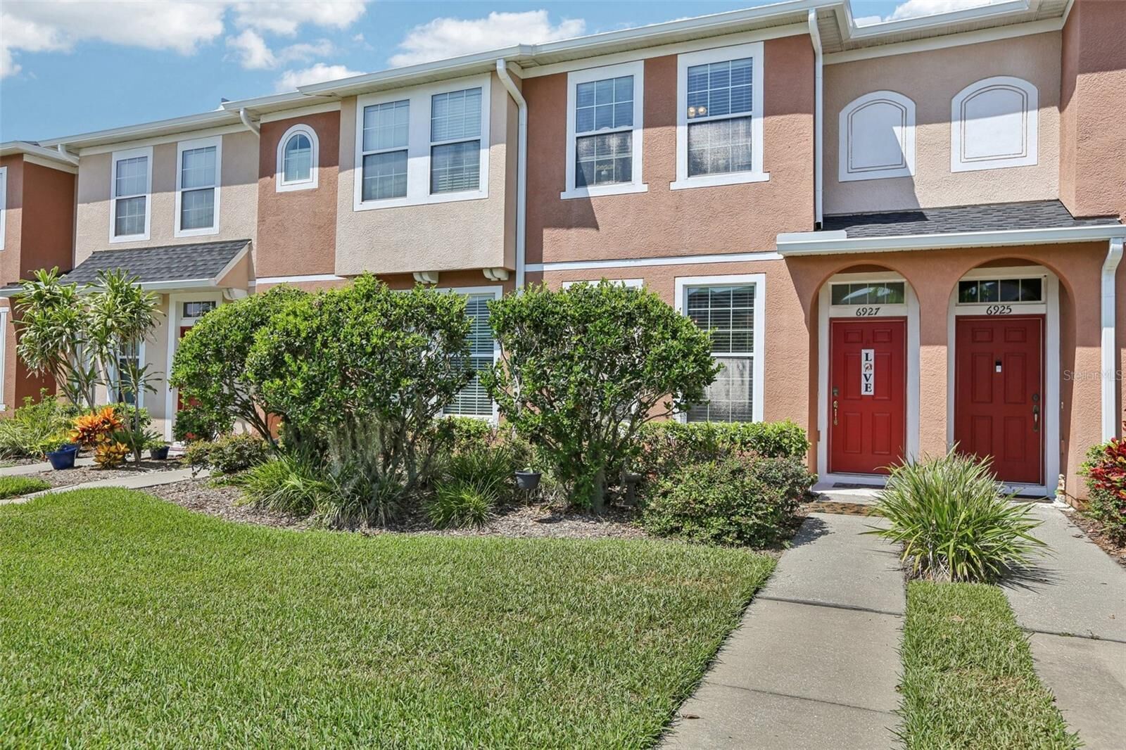 Property Photo: 6927 Towering Spruce Drive FL 33578