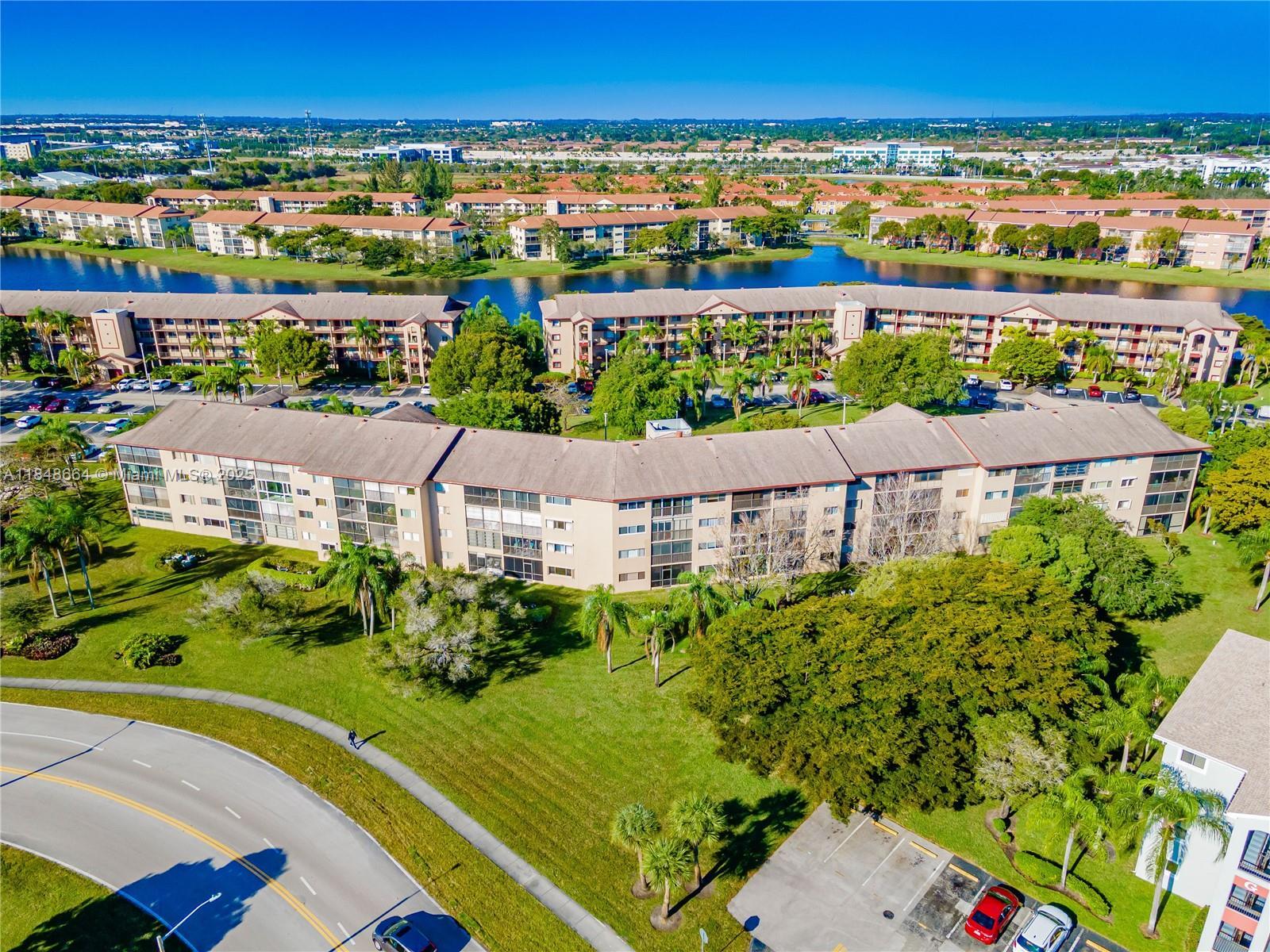Property Photo:  1401 SW 128th Ter 305H  FL 33027 