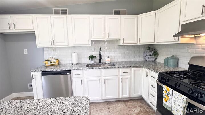 Property Photo:  6822 Friarwood Drive  MO 63134 