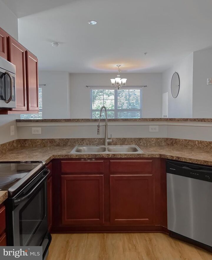 Property Photo:  23510 F D R Boulevard 207  MD 20619 